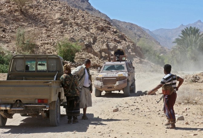 Yemeni fighters from the UAE-trained Giants Brigade, man a position near a village on the outskirts of Marib. (File/AFP)