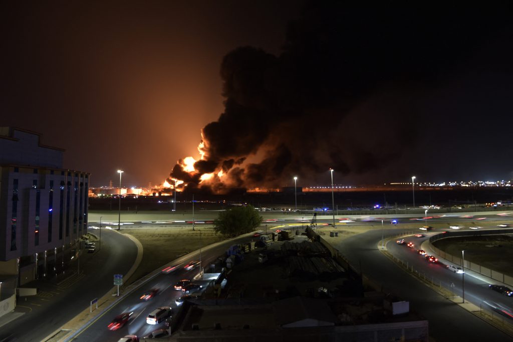 Smoke and flames rise in Saudi Arabia's Red Sea coastal city of Jeddah, on March 25, 2022, following a reported Yemeni rebels attack on a Saudi Aramco oil facility, March. 25, 2022. (AFP)