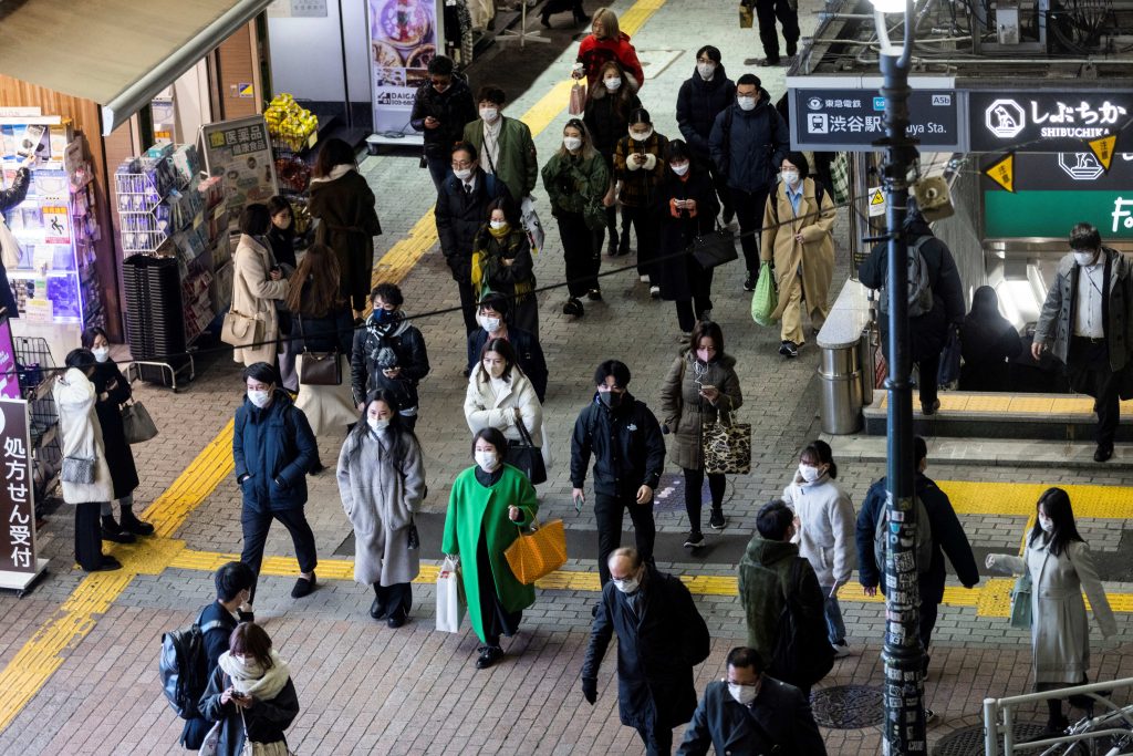 In Tokyo, 8,131 new COVID-19 cases were confirmed, a decline of about 1,100 from a week before. (AFP)