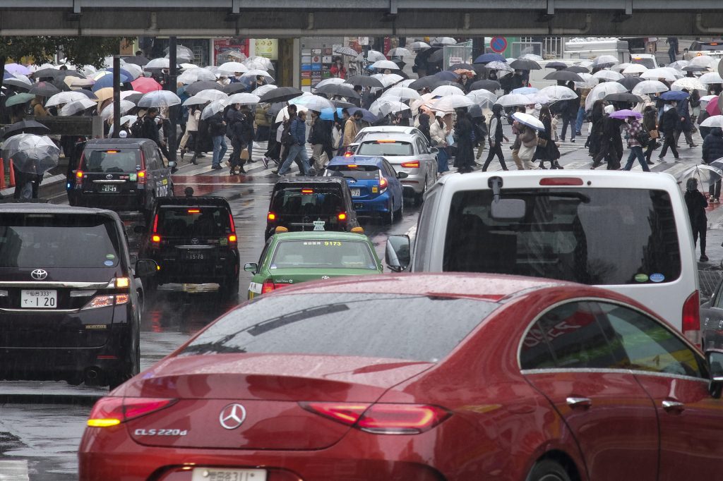 Tokyo logged 7,836 coronavirus cases on Tuesday, down 12% from the same day previous week. (AFP)