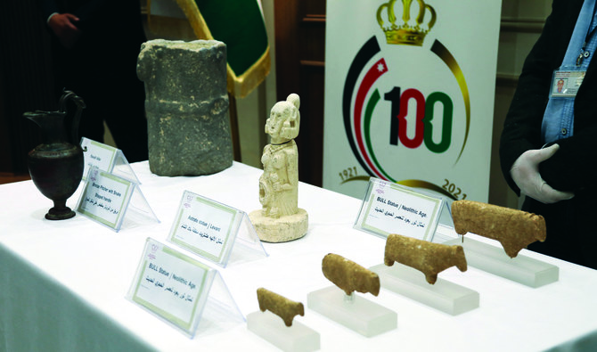 Artifacts handed over by the US to Jordan are displayed during a ceremony held by the authorities in cooperation with the US Embassy in Amman. (Reuters)