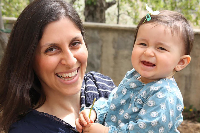 Nazanin Zaghari-Ratcliffe (L) posing for a photograph with her daughter Gabriella, had her passport returned on Tuesday. (FILE/AFP)