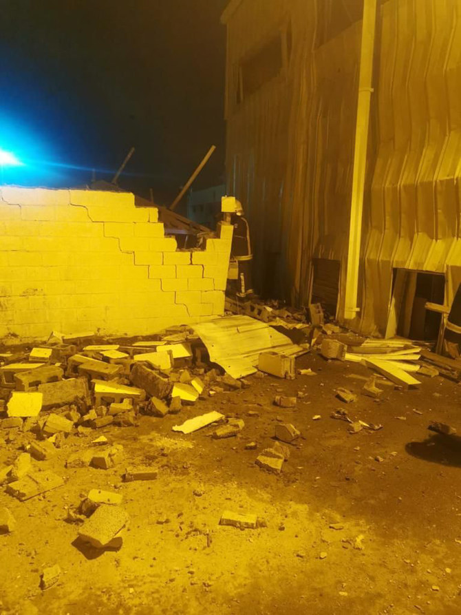 Falling debris from an intercepted missile damaged a residential area in Jazan on Saturday. (SPA)