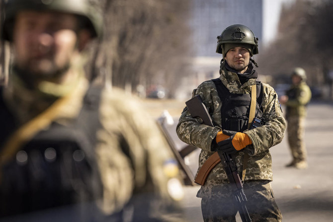 Explosions and bursts of gunfire shook Kyiv, and black smoke rose from a spot in the north. (AFP/FILE)
