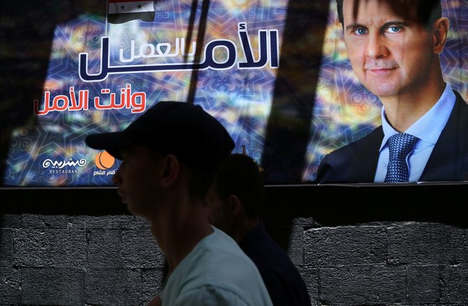 A poster of President Bashar Assad, Damascus, Syria, May 22, 2021. (Reuters)