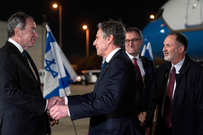 US Secretary of State Antony Blinken is welcomed by Israeli officials on his arrival at Ben Gurion airport in Lod, near the Israeli city of Tel Aviv, on March 26, 2022. (Jacquelyn Martin / POOL / AFP)
