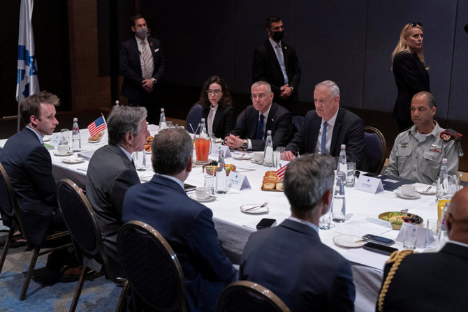 US Secretary of State Antony Blinken, across table second from left, meets with Israel's Defense Minister Benny Gantz at the David Citadel Hotel in Jerusalem March 27, 2022. (Pool via REUTERS)