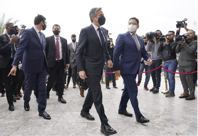 US Secretary of State Antony Blinken walks with Morocco’s Foreign Minister Nasser Bourita, right, as he arrives at the Foreign Ministry in Rabat, Morocco, Tuesday, March 29, 2022. (AP)