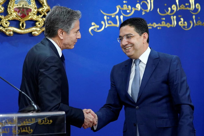 US Secretary of State Antony Blinken shakes hands with Morocco's Foreign Minister Nasser Bourita, following a news conference, at the Foreign Ministry in Rabat, Morocco, March 29, 2022. (Reuters)