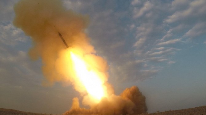 Ballistic missiles are launched from underground by Iran's Revolutionary Guard Corps during a military exercise. (File/AFP)