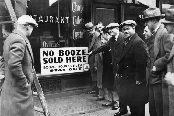 A New York restaurant makes its view on alcohol clear during the 1930s prohibition era, which holds a cautionary tale for Saudi Arabia. (Getty Images)