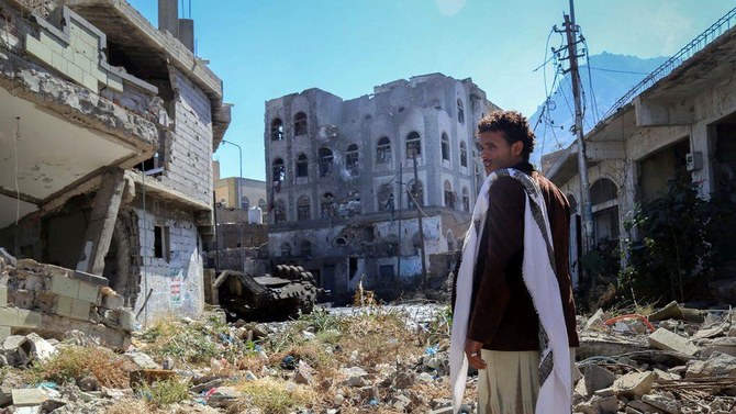 A Yemeni man surveys the damage to Taiz, southwestern Yemen. (Getty Images)