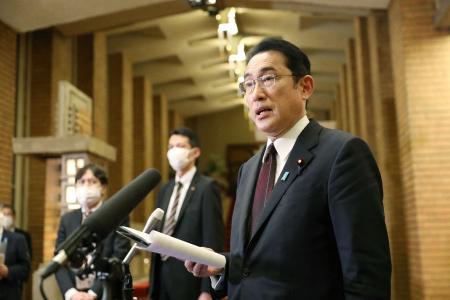 Japan's Prime Minister Fumio Kishida speaks to the media about the crisis between Russia and Ukraine, at the prime minister's official residence in Tokyo on February 27, 2022. (AFP)