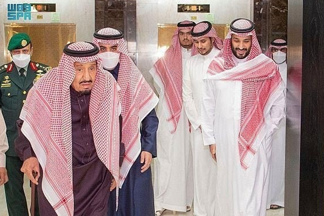 State television aired a video clip of the 86-year-old monarch walking using a cane with his son Crown Prince Mohammed bin Salman, the kingdom's de facto ruler, close by. (SPA)