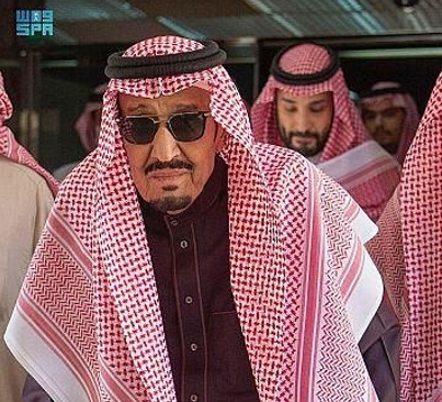 State television aired a video clip of the 86-year-old monarch walking using a cane with his son Crown Prince Mohammed bin Salman, the kingdom's de facto ruler, close by. (SPA)