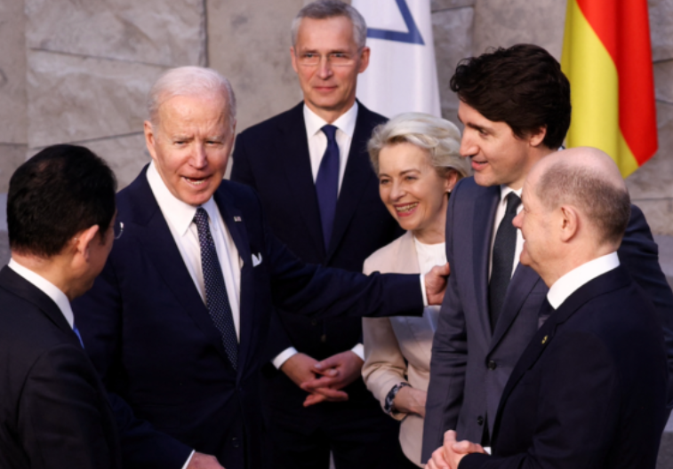 Biden speaks with Japan's PM Kishida, Germany's Chancellor Scholz, Canada's PM Trudeau, European Commission President Ursula von der Leyen and NATO Sec-Gen Jens Stoltenberg in Brussels. (Reuters)
