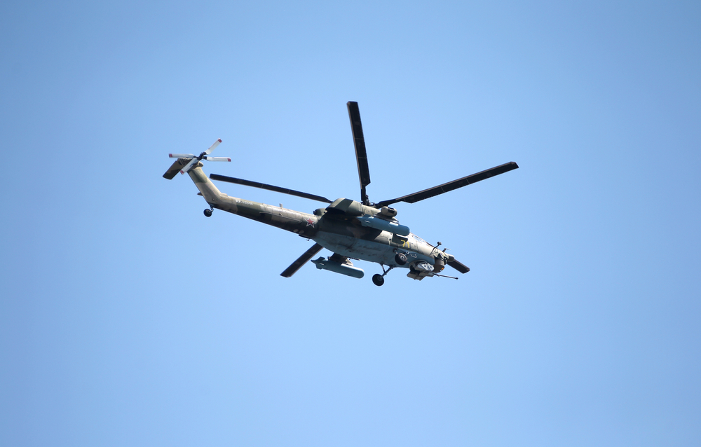 An air parade of military combat helicopters of Russian Air Force fly in skies of Moscow over Kremlin and Red Square in 75th anniversary of Victory during Victory Parade in 2020. (Shutterstock)