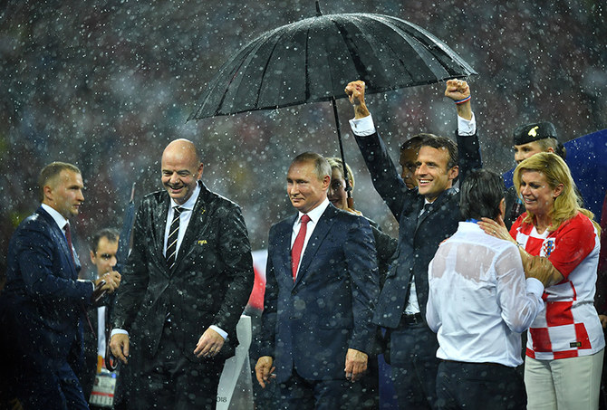 President of FIFA Gianni Infantino, Vladimir Putin and Emmanuel Macron during the trophy presentation at the 2018 FIFA World Cup final. (Reuters)