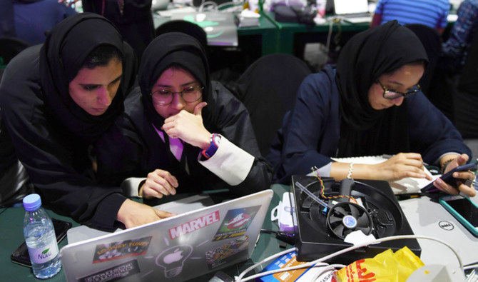 Participants including Saudi women attend a hackathon in Jeddah, Saudi Arabia on August 1, 2018. (AFP)