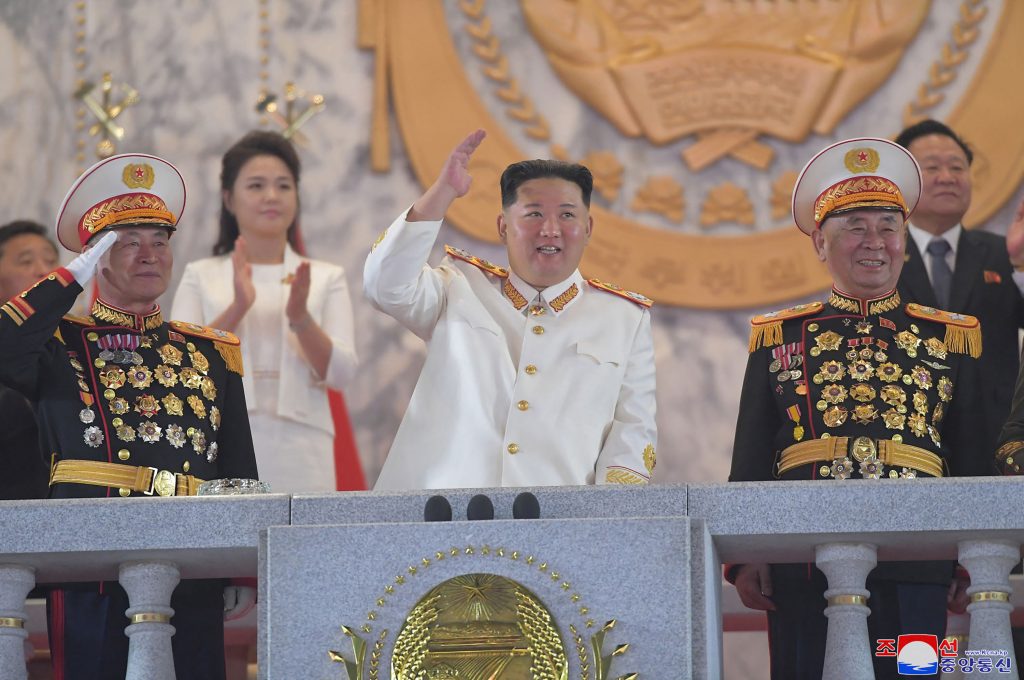 North Korean leader Kim Jong Un (C) attending a grand military parade held at Kim Il Sung Square in Pyongyang to commemorate the 90th founding anniversary of the Korean People's Revolutionary Army. (AFP)