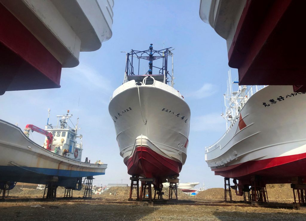 Fishing boats that are expected to depart for salmon and trout fishing this season sit perched on stilts, near the Pacific Ocean at Habomai port in Nemuro, on Japan's northern island of Hokkaido, April 12, 2022. Picture taken April 12, 2022. (AFP)