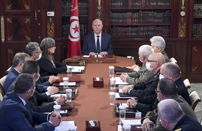 Tunisian President Kais Saied chairs a National Security Council on March 30, 2022 at the Carthage Palace. (Tunisian Presidency photo via AFP)