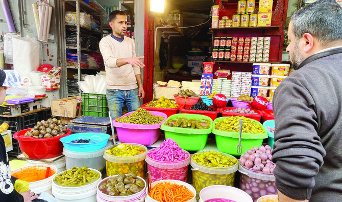Pickle trade flourishes during the month of Ramadan and business owners hire extra workers to help them meet the demand. (Supplied)