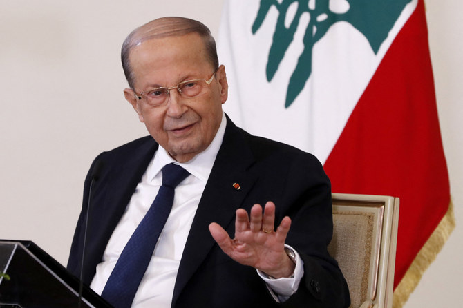 The aim of the mega centers Aoun favors is to allow voters to cast their ballots outside the areas in which they are registered. (AFP/File)