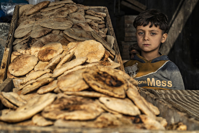 The Ukrainian conflict’s disruption of the distribution of grain is hitting the price of staples such as bread. (AFP)