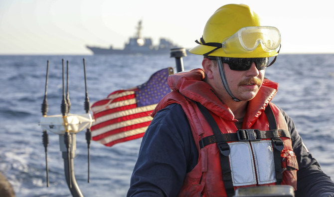 Boatswain's Mate 2nd Class Hunter Pemberton assigned to the USS Cole takes part in an exercise on the Red Sea March 29, 2022. (AP/File)