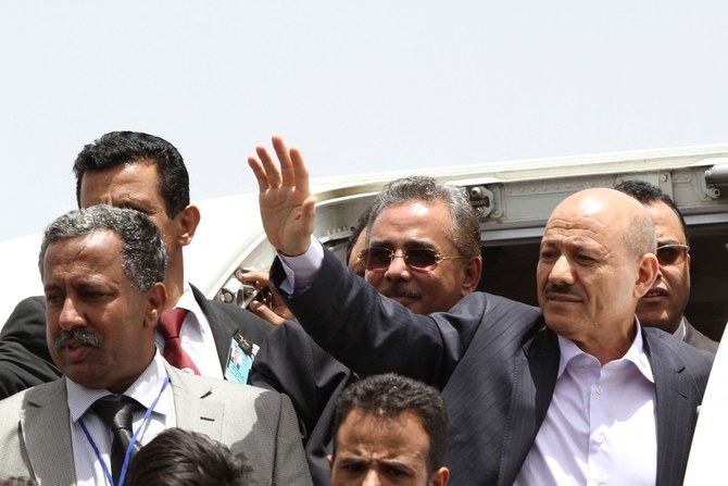 Rashad Al-Alimi, then deputy prime minister for security affairs, waves as he arrives at Sanaa airport on June 13, 2012. (Reuters/File)