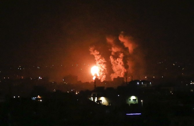 Flames and smoke rise during Israeli airstrikes central Gaza strip in on April 21, 2022. (AFP)