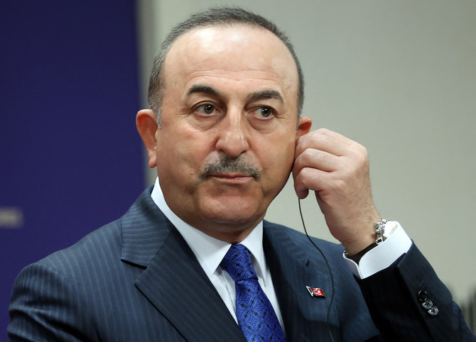 Turkish Foreign Minister Mevlut Cavusoglu gives a press conference after his meeting with his Hungarian counterpart in Ankara, on April 19, 2022. (AFP)