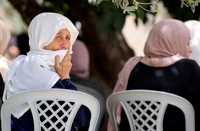 Palestinian mourners attend the funeral of Ahmad Massad, 21, in the village of Burqin, west of Jenin, Apr. 27, 2022. (AFP)