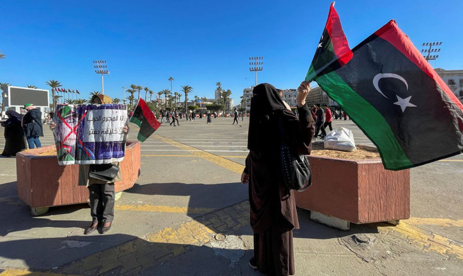 Protesters hold political banners and Libyan flags at Martyrs' Square in Tripoli, Libya. (Reuters/File)