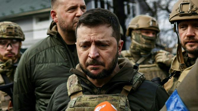 Ukrainian President Volodymyr Zelensky speaks to the press in the town of Bucha, northwest of the Ukrainian capital Kyiv, April 4, 2022. (AFP)