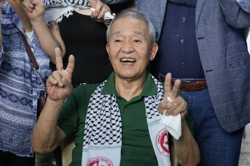 Kozo Okamoto, 74, a member of the Japanese Red Army guerrilla group poases to supporters as he arrives at a Palestinian cemetery to visit a memorial for four Japanese who died in support of Palestinians, in Beirut, Lebanon, May. 30, 2022. (File photo/AP)