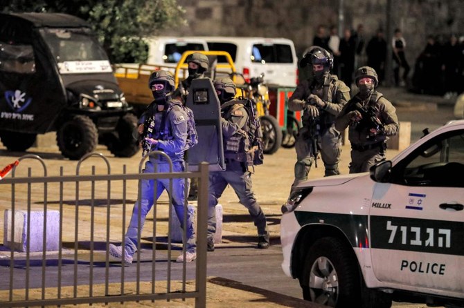 Members of the Yamas special forces counter-terrorism unit patrol at the scene of a stabbing attack at the Damascus Gate of the Old City of Jerusalem on May 8, 2022. (AFP)