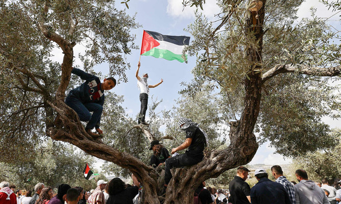 Arab Israeli protestors during a demonstration near the city of Sakhnin in northern Israel. (AFP)