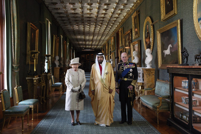 Britain's Queen Elizabeth II (L) and Prince Philip welcome Sheikh Khalifa at Windsor Castle during his state visit to Britain on April 30, 2013. (AFP)