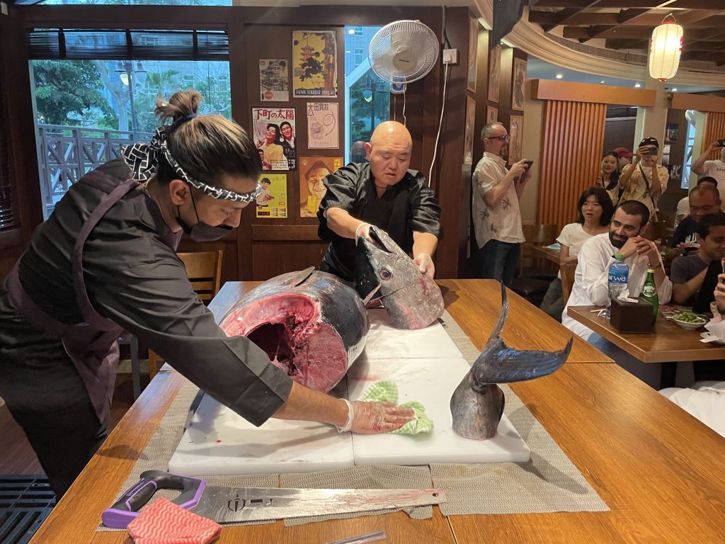 The Bluefin Tuna was placed on a large cutting board for all diners to watch as the chef used multiple designated knives to elaborately cut up the fish. (ANJ Photo)