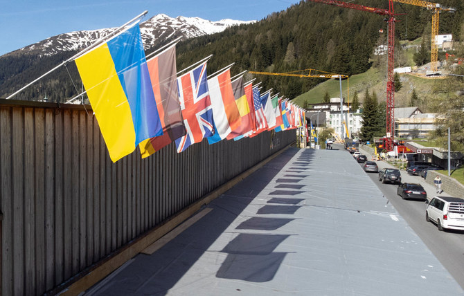 Swiss soldiers build fences in front of the Kongress Hotel Davos ahead of the upcoming World Economic Forum in Davos, Switzerland. (Reuters)