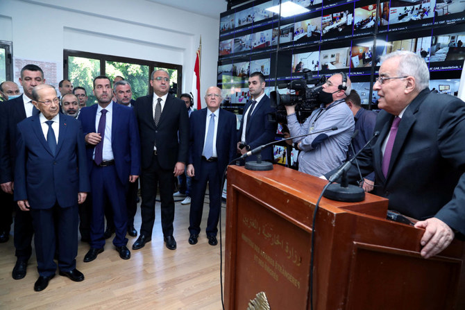 Lebanese President Michel Aoun listens to FM Abdallah Bou Habib speak in Beirut on May 8, 2022. (Dalati Nohra via REUTERS)