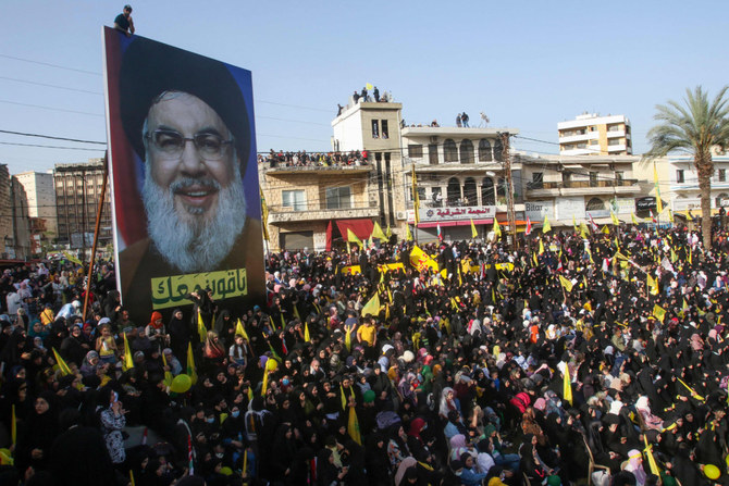 Supporters of Lebanon's Hezbollah group listen to a speech by their leader Hassan Nasrallah during a rally in the southern city