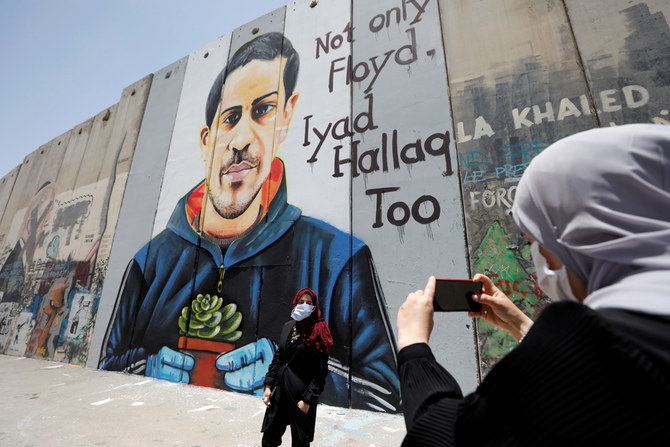 A mural depicting Iyad Hallaq and George Floyd, Bethlehem, West Bank, June 18, 2020. (Reuters)
