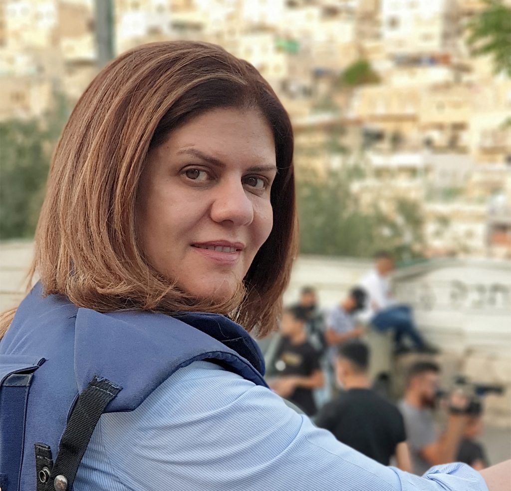 This handout file picture obtained from a former colleague of Al-Jazeera's late veteran TV journalist Shireen Abu Aqleh (Akleh), shows her reporting from Jerusalem on June 12, 2021. (AFP)