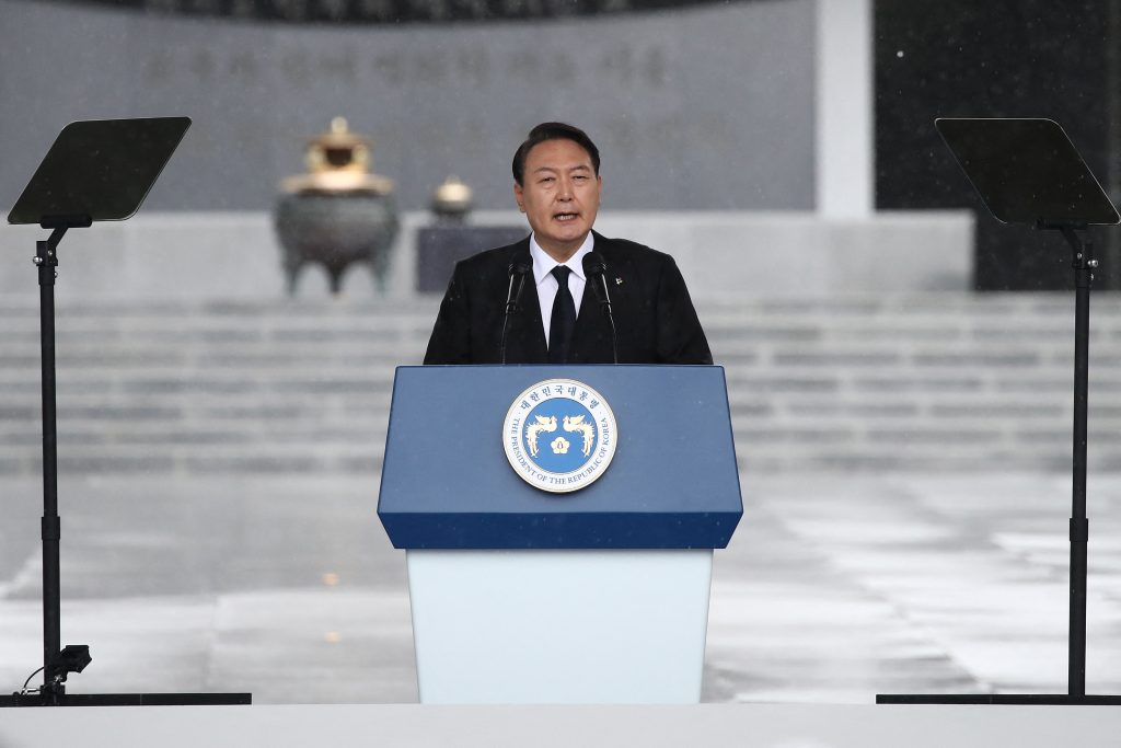 It was the first time for Yoon and Kishida to meet in person, with the face-to-face talks lasting three or four minutes. They held phone talks in March, right after Yoon won the presidential election that month. (AFP)