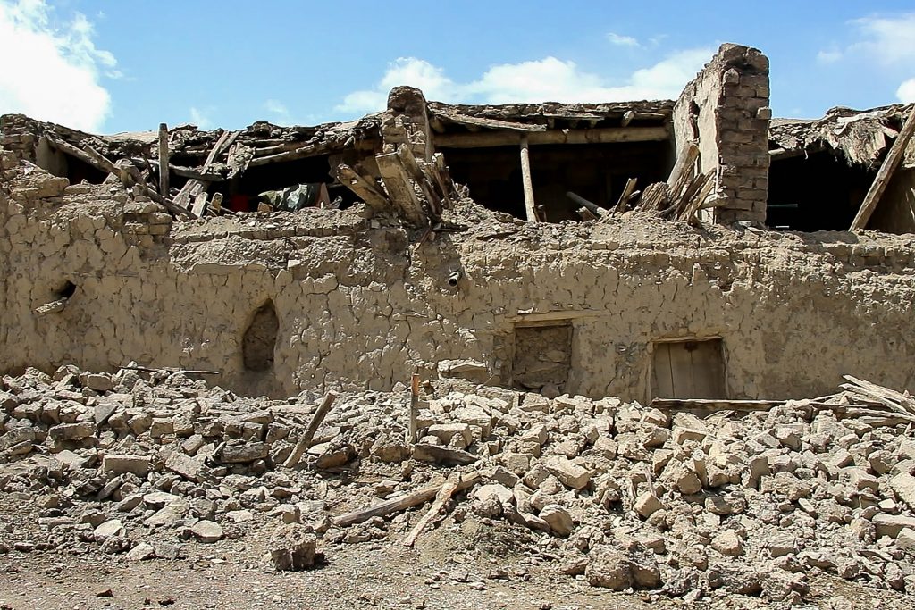 Damaged houses are pictured following an earthquake in Gayan district, Paktika province on June 22, 2022. The 5.9-magnitude quake, which killed at least 1,000 people, struck hardest in the rugged east, where people already lead hardscrabble lives in the grip of a humanitarian crisis made worse since the Taliban takeover in August. (AFP)