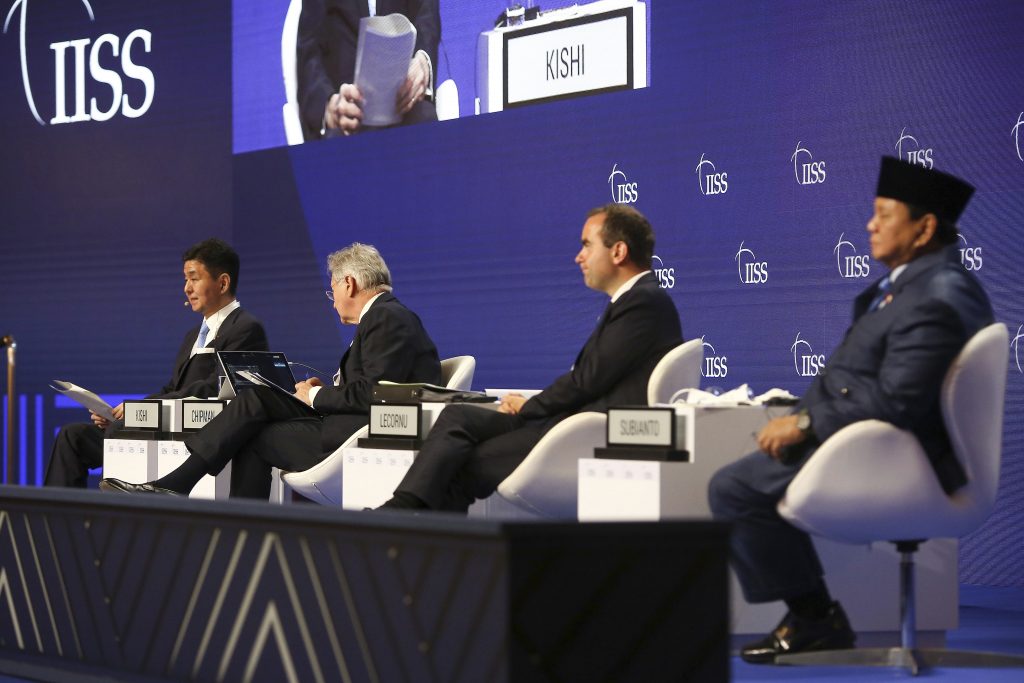 Japan's Defense Minster Nobuo Kishi, left, speaks at a plenary session during the 19th International Institute for Strategic Studies (IISS) Shangri-la Dialogue, Asia's annual defense and security forum, in Singapore, June 11, 2022. (File photo/AP)