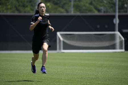 Yoshimi Yamashita of Japan speaks during an interview with The Associated Press Monday, June 27, 2022, at JFA YUME Field in Chiba, near Tokyo. (AP)